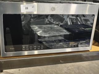 BRAND NEW GE Profile 2.1 cu ft Over-the-Range Sensor Microwave Oven, model PVM9005SJ8SS, with minor scratches.