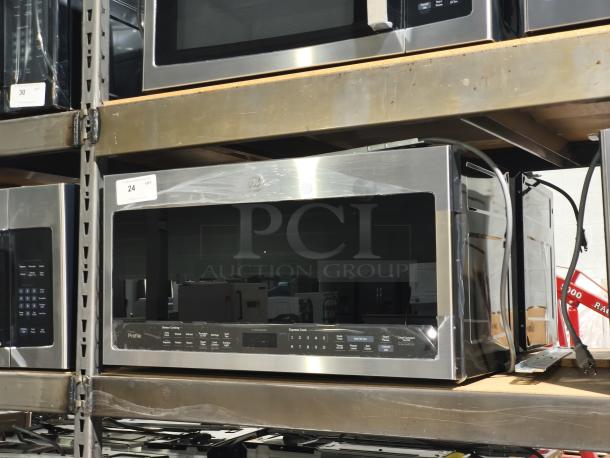 BRAND NEW GE 1.6 cu ft Over-the-Range Microwave Model PVM9005SJ8SS, stainless steel, slight scratch, visible control panel.