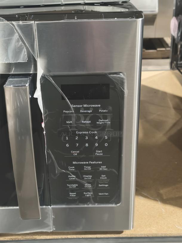 Brand new GE JVM6175SK6SS 1.7 cu ft over-the-range microwave with scratch and dent, stainless steel, sensor features.
