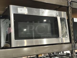 BRAND NEW GE 1.7 cu ft Over-the-Range Microwave Oven, Model JVM6175SK6SS, with minor scratches, stainless steel finish.