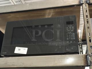 BRAND NEW scratch and dent GE Profile 2.2 cu ft built-in sensor microwave, model PCWK22U1WDD, visible control panel.