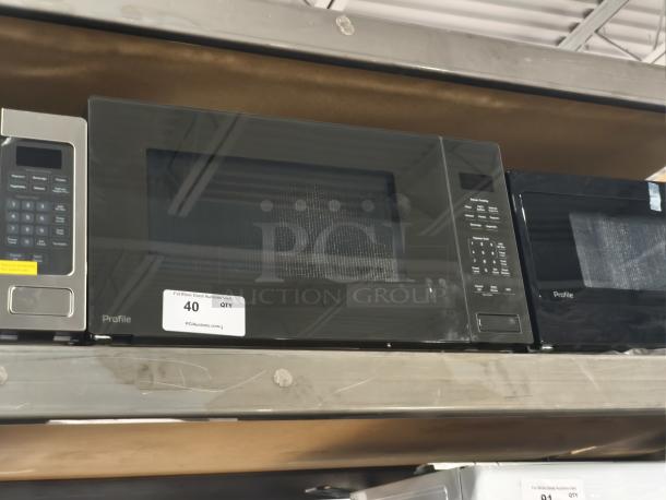 BRAND NEW SCRATCH AND DENT GE Profile 2.2 cu ft Built-In Sensor Microwave Oven, Model PCWK22U1WDD, black finish.