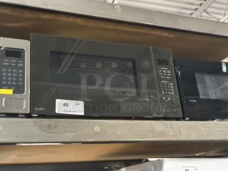 BRAND NEW SCRATCH AND DENT GE Profile 2.2 cu ft Built-In Sensor Microwave Oven, Model PCWK22U1WDD, black finish.
