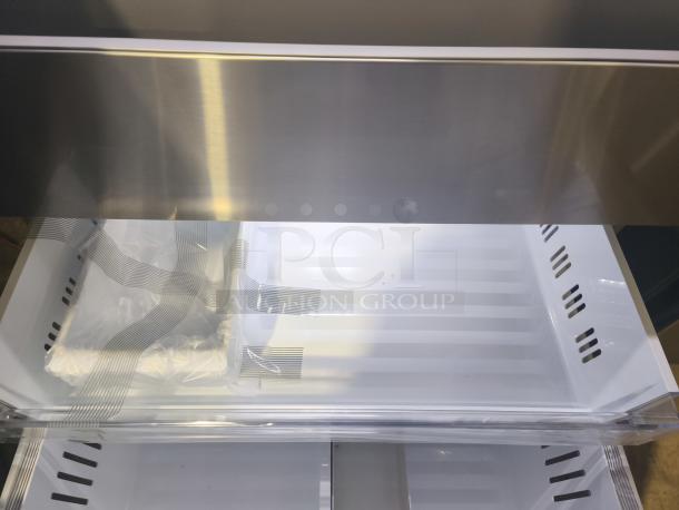 LG Counter-Depth MAX™ French Door Refrigerator, model LG LF24Z6530S /00, with spacious interior, new condition.