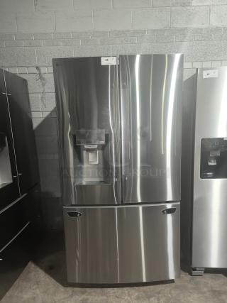 LG LRFS28XBS 27.7 cu ft Smart French Door Refrigerator, new condition, stainless steel, with water dispenser.