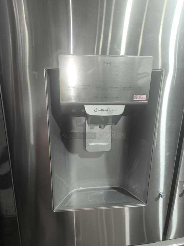 LG LRFS28XBS 27.7 cu ft Smart French Door Refrigerator, stainless steel finish, Thinq controls, ice and water dispenser.