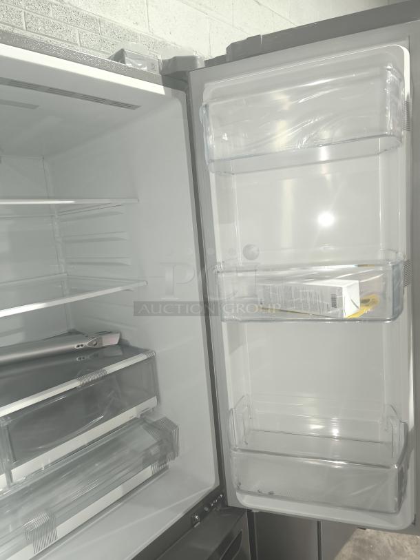 NEW LG LRFS28XBS 27.7 cu ft Smart French Door Refrigerator, model LRFD28XBS/05, pristine condition, spacious interior.