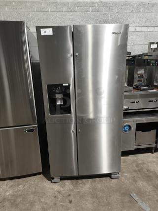 Whirlpool 33-inch side-by-side refrigerator, model WRS321SDHZ13, fingerprint-resistant stainless steel, 21.4 cu ft, new condition.