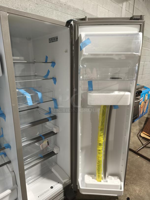 Whirlpool 33-inch side-by-side refrigerator, model WRS321SDHZ13, 21.4 cu ft, fingerprint-resistant stainless steel, new condition.