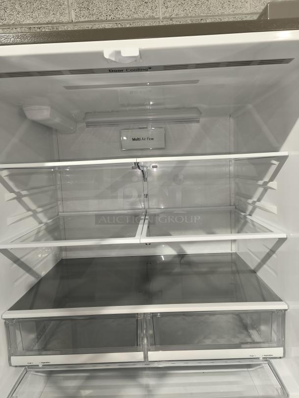 New LG 28 cu ft 3-door French door refrigerator with ice and water, model LRFS28XBS/05. Features door cooling and multi-air flow.