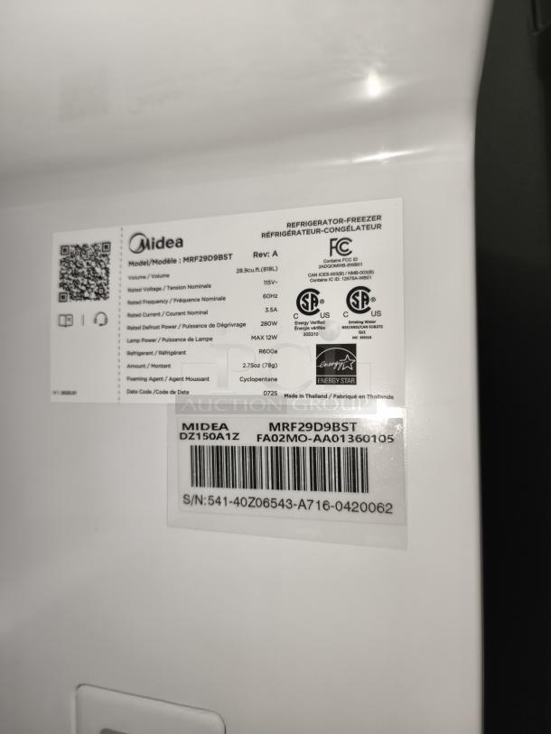 Label on Midea MRF29D9BST refrigerator, showing model info, 29 cu. ft. capacity, Energy Star rating, and manufacturing details.