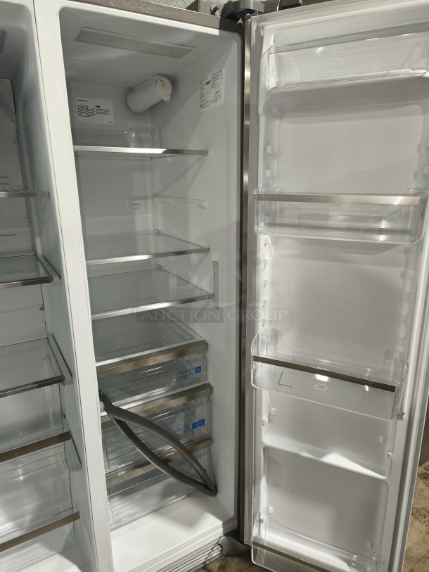Frigidaire Gallery Side-by-Side Refrigerator, model GRSS2652AF, 25.6 cu ft, new condition, spacious interior with shelves.