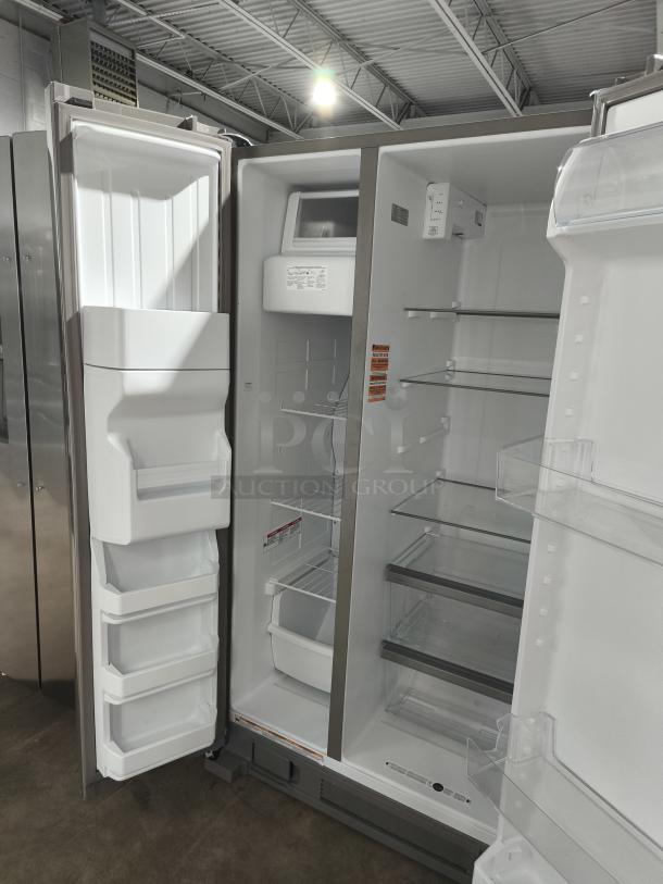NEW Whirlpool 36-inch side-by-side refrigerator, model WRS315SDHZ19, open showing spacious white interior and shelves.