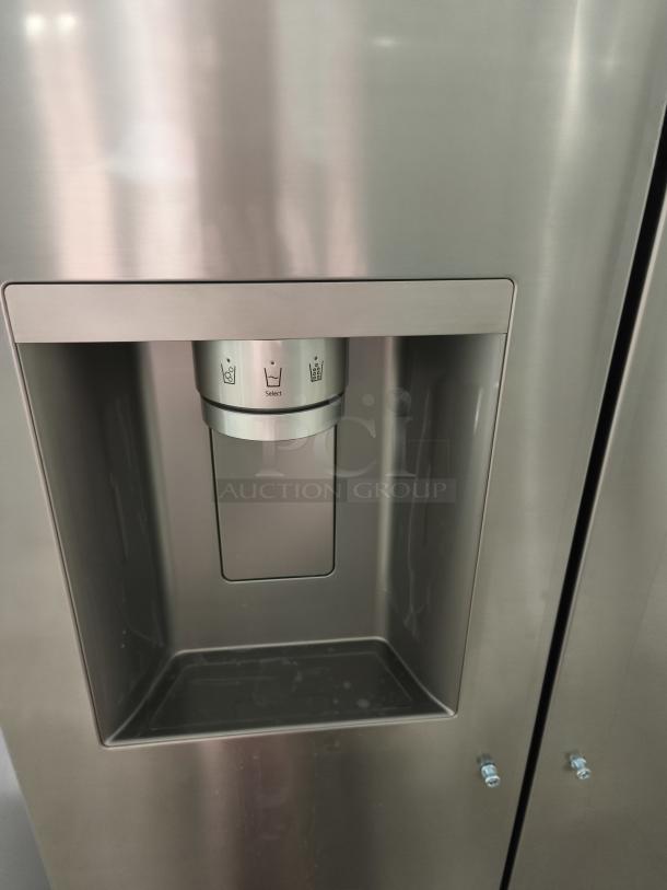 LG 27 cu. ft. Smart Side-by-Side Refrigerator, model LL27T3530S/00, with Smooth Touch Ice & Water Dispenser in new condition.