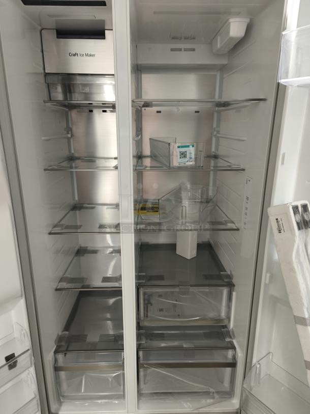 LG 27 cu. ft. smart side-by-side refrigerator, model LL27T3530S/00, new condition, with Smooth Touch Ice & Water Dispenser.