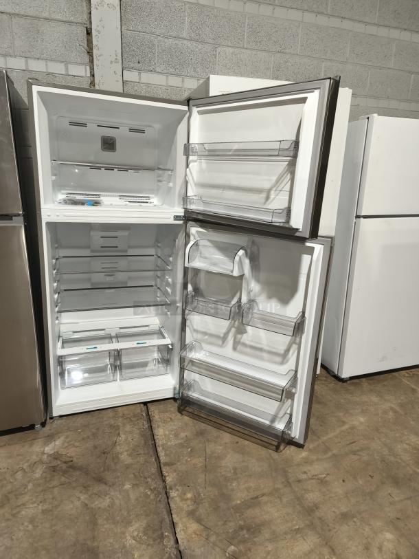NEW Midea MRT18D3BST top-freezer fridge, 18.1 cu ft, garage-ready, stainless steel finish, adjustable shelves, new condition.