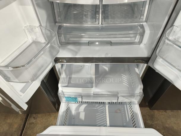 NEW LG 22 cu ft French Door Refrigerator, Model LFCS2250S/07, open view showing spacious interior, crisp white finish.