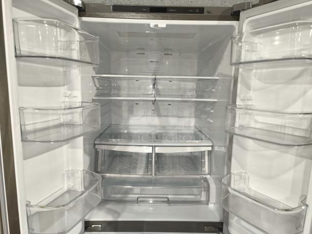 NEW LG 22 cu ft French Door Refrigerator, model LFCS2250S/07, 30-inch width, stainless steel, interior view, pristine condition.