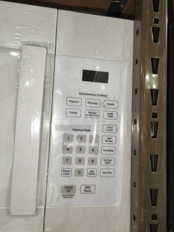 GE 1.6 cu ft Over-the-Range Microwave Oven, Model JVM3160DF9WW, new condition, features digital keypad.