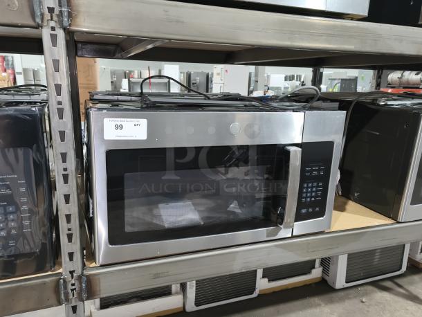 BRAND NEW GE 1.6 cu ft Over-the-Range Microwave Oven, model JVM3162RJSS, stainless steel, scratch and dent condition, on shelf.
