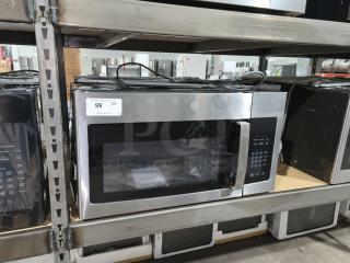 BRAND NEW GE 1.6 cu ft Over-the-Range Microwave Oven, model JVM3162RJSS, stainless steel, scratch and dent condition, on shelf.