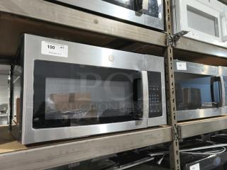 Brand new GE JVM3162RJSS over-the-range microwave, 1.6 cu ft, stainless steel, minor scratches, visible control panel.