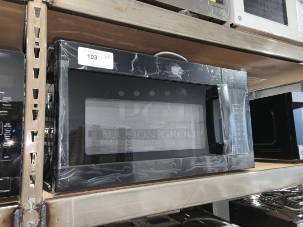 Brand new GE 1.6 cu ft Over-the-Range Microwave Oven, model JVM3160DFBB, black, with minor cosmetic dents.
