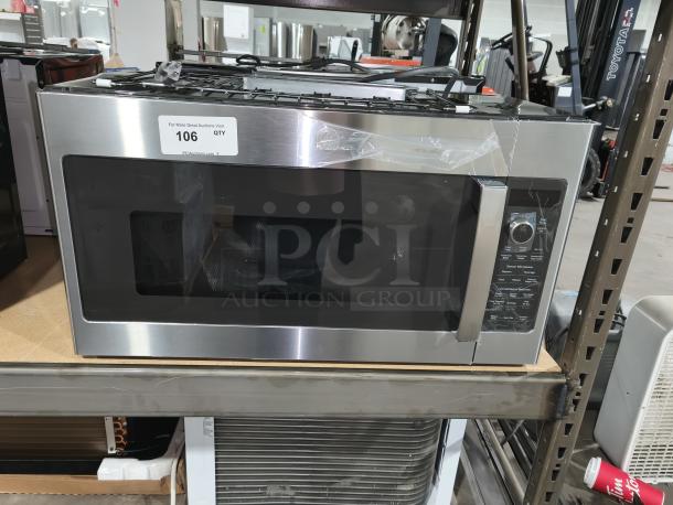 Brand new GE Profile 1.7 cu ft convection over-the-range microwave (Model PVM9179SRSS) with visible scratch and dent.