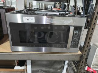 Brand new GE Profile 1.7 cu ft convection over-the-range microwave (Model PVM9179SRSS) with visible scratch and dent.