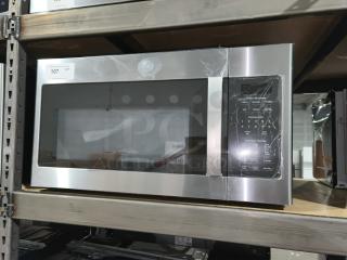 BRAND NEW GE Over-the-Range Sensor Microwave Oven, Model JVM617YK6FS. Minor dents, tags indicate model and quantity.