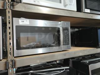 Brand new GE 1.7 cu ft over-the-range sensor microwave, model JVM6175YK6FS, stainless steel, scratch and dent condition, on warehouse shelf.