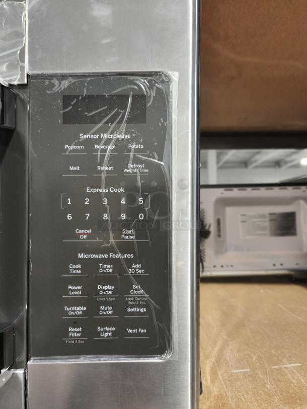 BRAND NEW GE 1.7 cu ft over-the-range microwave, Model JVM6175YK6FS, sensor features, slight scratch on control panel.