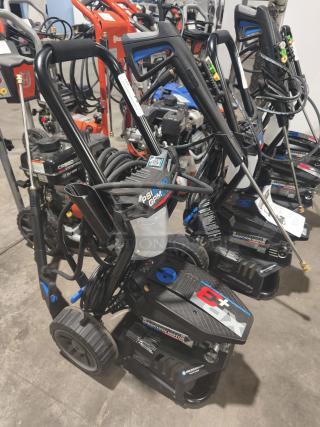 AR Blue Clean XP3-2400 Electric Pressure Washer, tested and working, features durable wheels, hose, and spray nozzles.