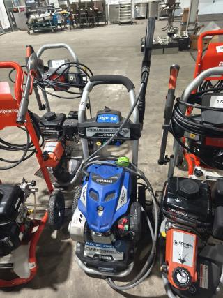 AR Blue Clean XP3-2400 Electric Pressure Washer, used condition, with visible hose and power controls, suitable for heavy-duty cleaning.
