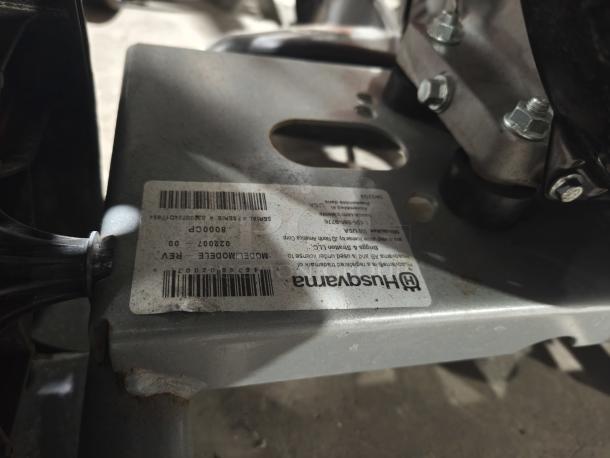 Husqvarna PW-3200 gas pressure washer, Model 022007. Label with serial number 80000P and details visible. Working condition.