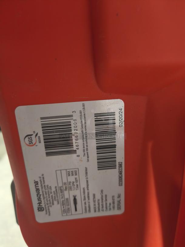 Husqvarna PW2300 Electric Pressure Washer label showing model, serial number, and compliance information.