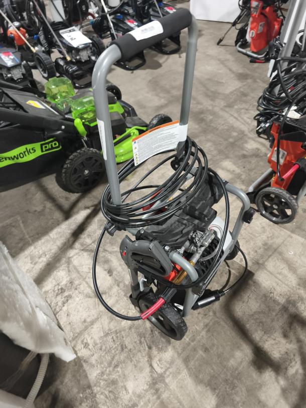 Husqvarna PW2300 Electric Pressure Washer, new condition, features coiled hose, sturdy frame, labeled handle.