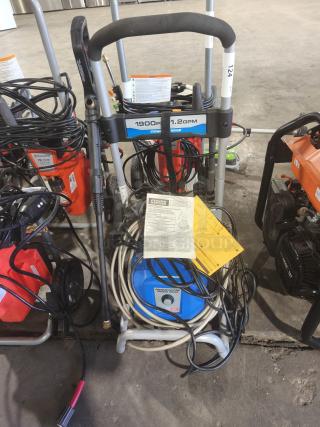 PowerStroke PS141913 pressure washer, 1900 PSI, 1.2 GPM. Includes manuals, hoses coiled on frame. Excellent condition.