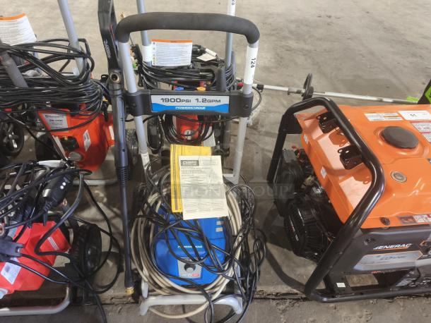 PowerStroke PS141913 pressure washer, 1900 PSI, 1.2 GPM, well-maintained, with hoses and manual, ideal for home use.