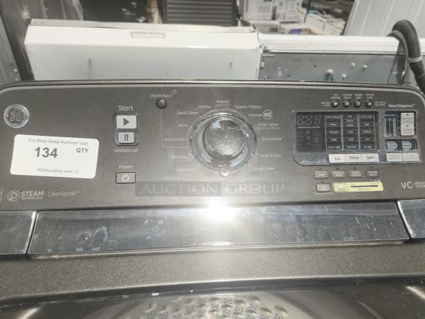 GE 5.0 cu ft Top-Load Washer, Model GTWS8655D0MC, with Steam, SmartDispense. Features control panel and settings.