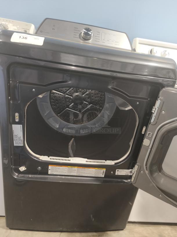 GE Profile 7.4 cu ft Smart Electric Dryer, Diamond Gray, model PTD60EBPRDG, open door view, control panel visible.