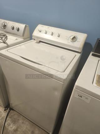 Kenmore top-load washing machine, model 11027721600, white, gently used, visible control panel with dials.