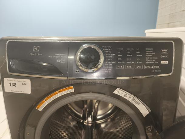 Electrolux ELFW7637 front-load washer, 4.5 cu ft, 600 Series, SmartBoost, Perfect Steam, control panel visible, metallic finish.