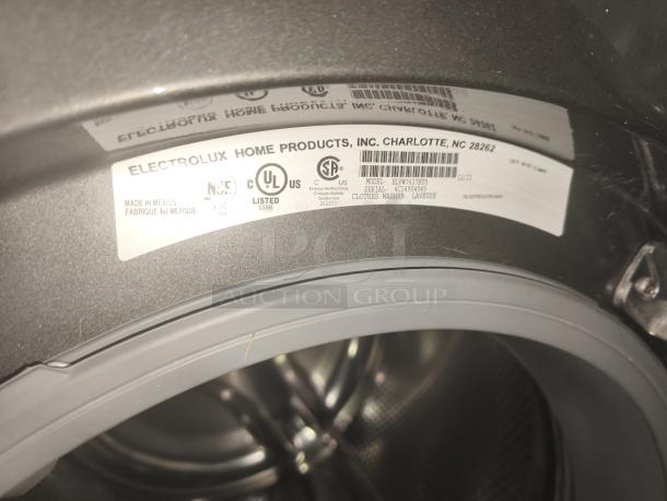 Electrolux ELFW7637 front-load washer label showing model, UL certification, and manufacturing location in Mexico.