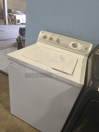 GE 4.1 cu ft top-load washer, model WHRE5550K2WW. Excellent condition with visible controls and settings.