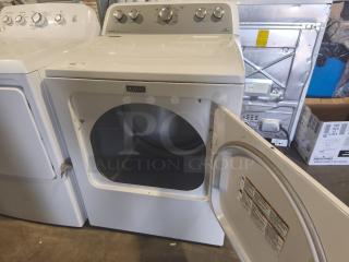 Maytag 7.0 cu ft electric dryer, model MEDX655DW1, with sanitize cycle and IntelliDry® sensor. Door open, in good condition.