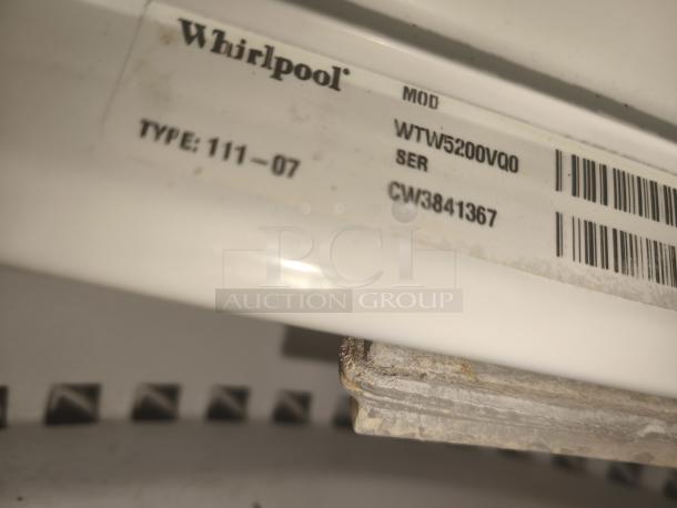 Whirlpool top-load washer model WTW5200VQ0, type 111-07, serial CW3841367 label. Visible wear, 3.5 cu ft capacity.