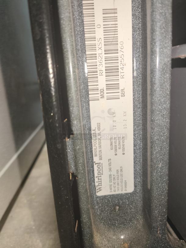 Whirlpool RF362LXSS electric range label, showing model and serial numbers. Overall condition not visible. 