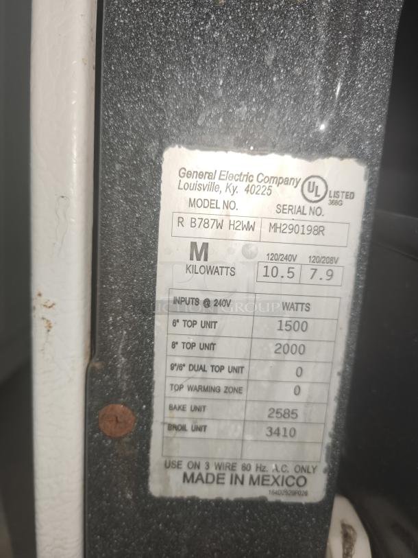 Label on Hotpoint 30" Free-Standing Electric Range, model RB787WH2WW, lists inputs and wattage. Made in Mexico.