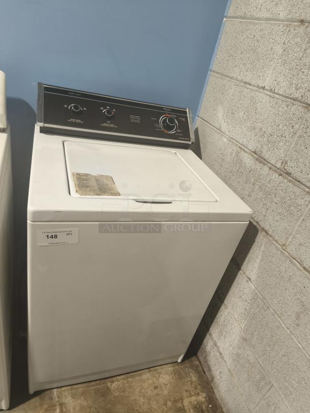 Whirlpool Top-Load Heavy Duty Washer, model LA5580XTW1, in good condition. Features easy access controls and durable build.